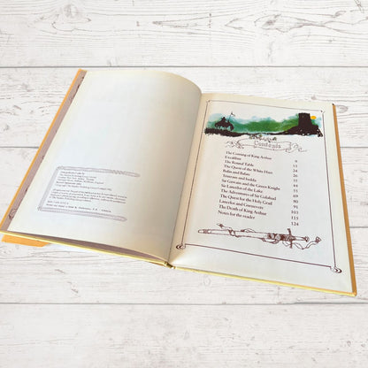 Vintage illustrated book of Arthurian legends On a white background 