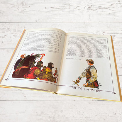 Vintage illustrated book of Arthurian legends 1982 edition on a white background 