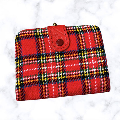 Red plaid wallet with a red flap on a white background