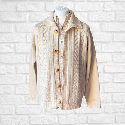 Wool vintage cream mens cardigan on a brick backdrop 