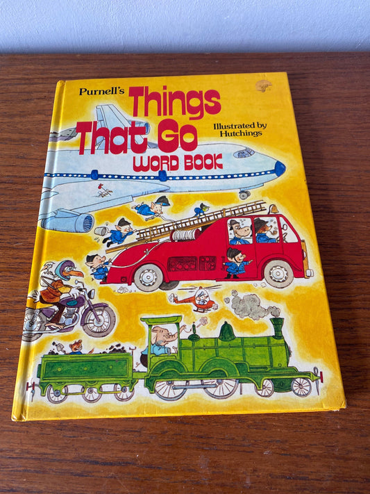 Hard back vintage children picture word book featuring transport illustrations 