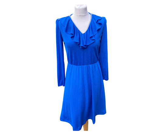 Bright blue 80s dress with frill trim around the neckline and gold detailing 