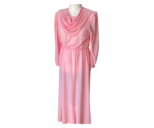 Full length pink vintage dress with cowl neckline, long sleeves and pearl and lace detailing to the shoulder 