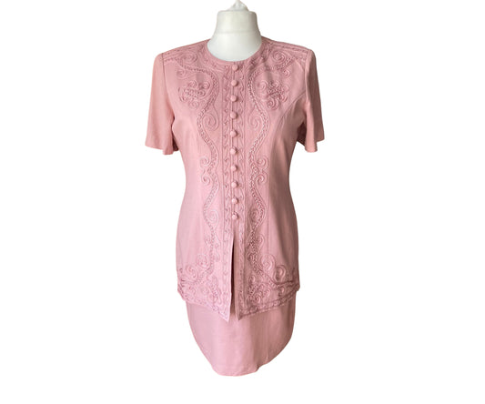 Vintage 80s pink suit dress with fabric covered buttons, short sleeves and soutache detailing.  