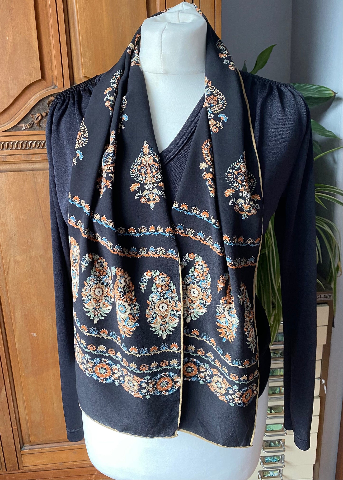 Long vintage black and gold paisley print  scarf with hand rolled edges. Great gift idea