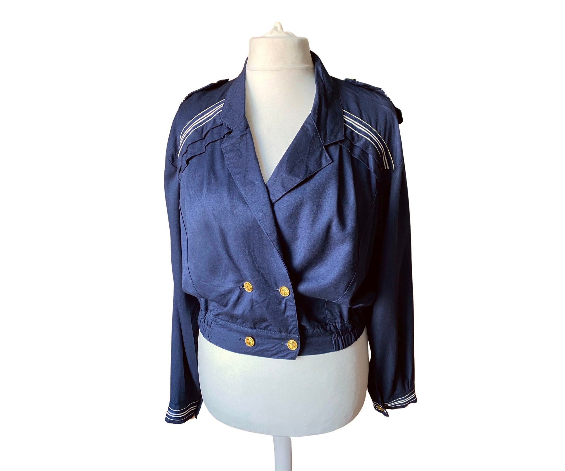Navy blue nautical style 80s bomber jacket with epaulettes and gold buttons 