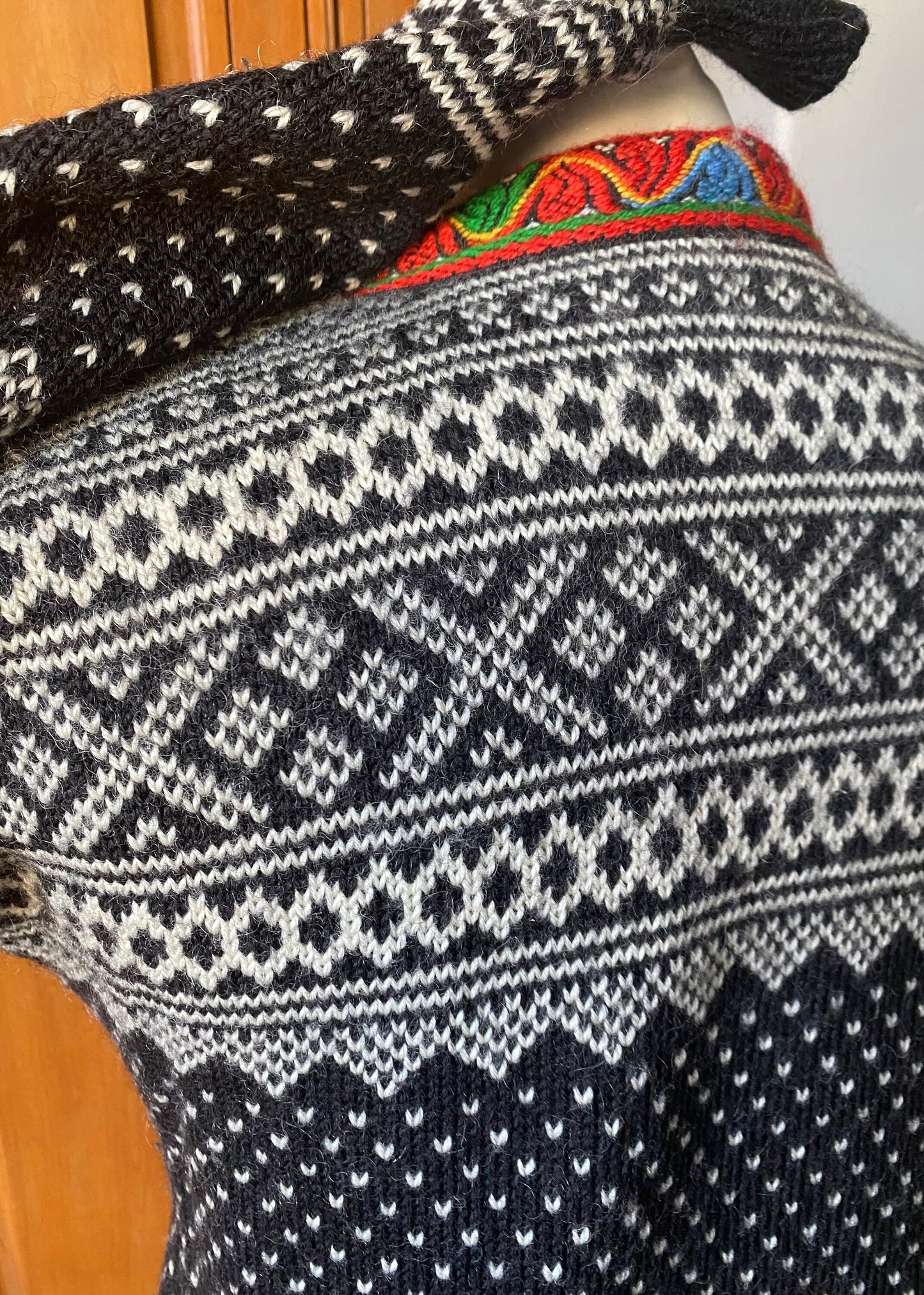 Vintage Nordic wool jumper  with embroidered, metal clasp neckline.with.App. U.K size 8-12